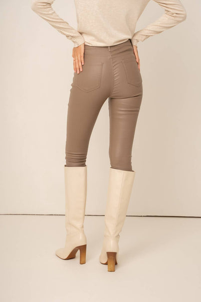 Taupe faux leather pants. Coated jean style pants. 