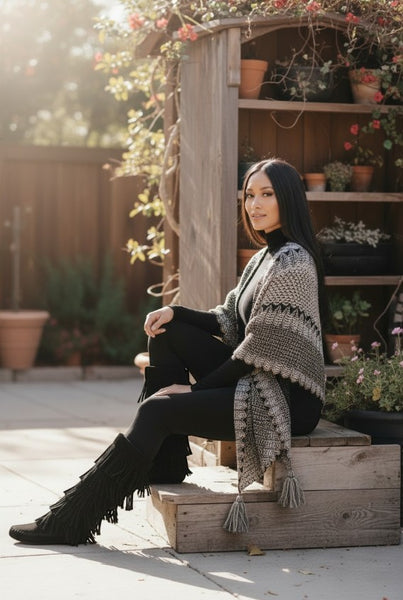 Collab Boutique black faux suede moccasin boots with layered fringe and side zipper.