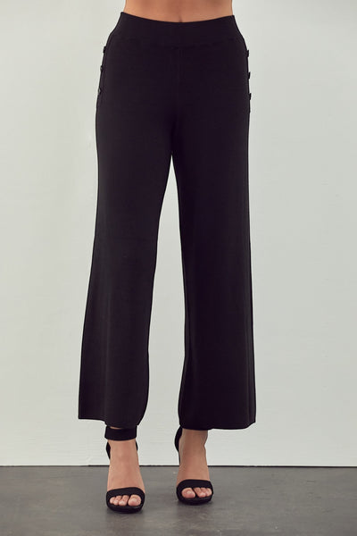 Collab Boutique black knit wide leg capri pants with ribbed elastic waist and button detail.