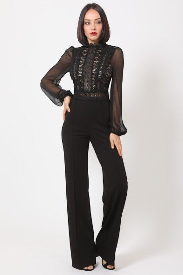 Collab Boutique black wide leg jumpsuit with sheer lace bodice and balloon sleeves, worn by a model.