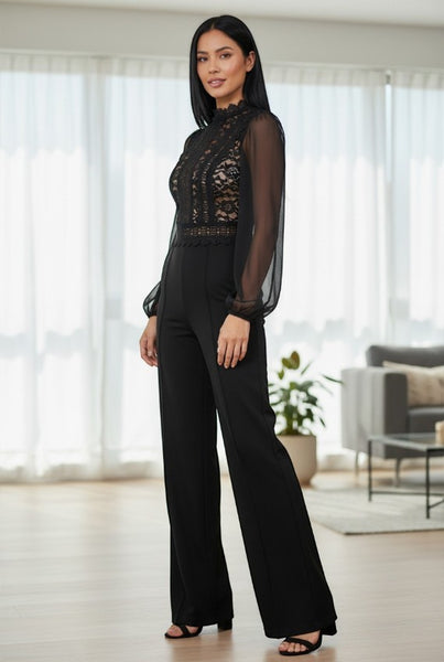 Collab Boutique black wide leg jumpsuit with sheer lace bodice and balloon sleeves. Model wears size S.