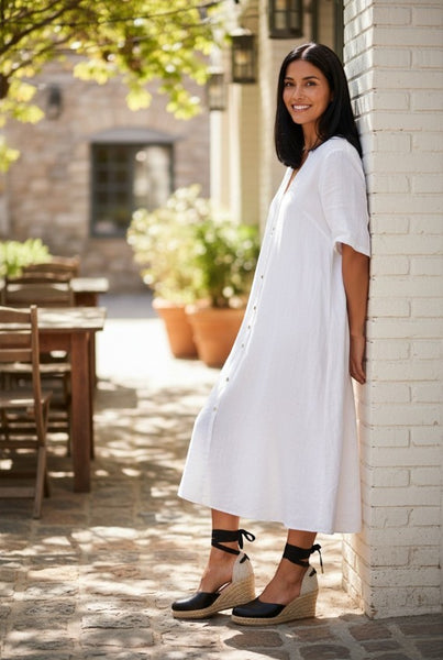 Collab Boutique black leather espadrille wedge sandals with ankle ties and jute soles.