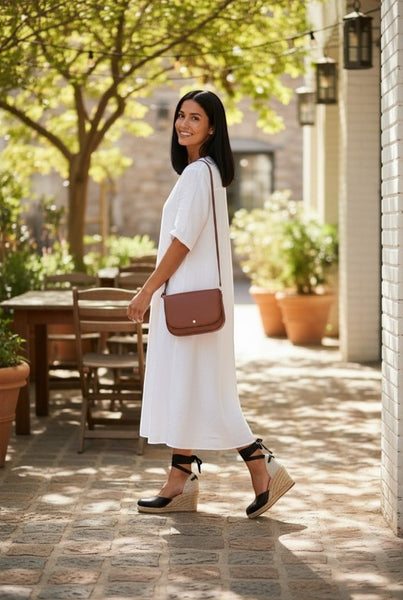 Collab Boutique black leather espadrille wedge sandals with ankle ties and jute soles.
