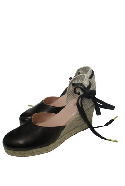 Collab Boutique black leather espadrille wedge sandals with jute sole and black tie laces with gold tips.