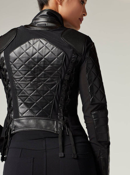 Collab Boutique black diamond quilted leather motorcycle jacket with adjustable back laces and mesh panels. Model wears size S.