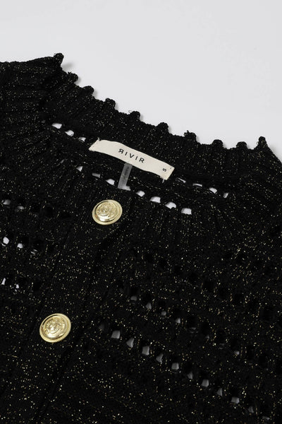 Collab Boutique black lurex knit cardigan with gold buttons and crochet detailing. Crew neck, long sleeves, fitted.