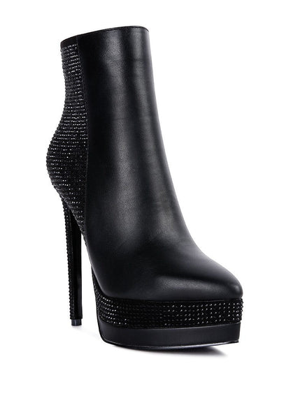 Collab Boutique black faux leather ankle boots with rhinestone detail on heel, platform, and back. Side zipper closure.