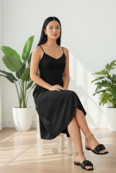 Collab Boutique black ruffle slip-on flat sandals.