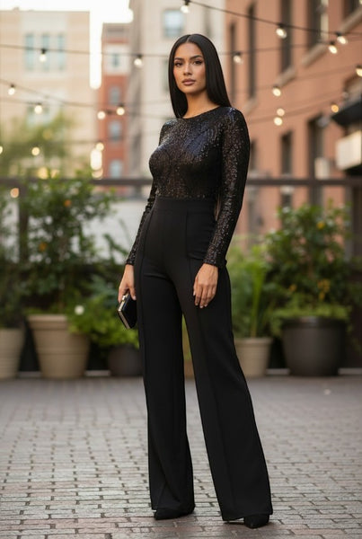 Collab Boutique black sequin jumpsuit with long sleeves and flared legs. Model is 5'8, wearing size S.