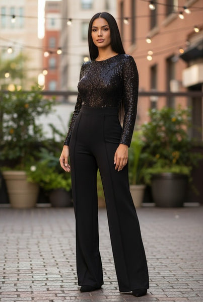 Collab Boutique black sequin jumpsuit with long sleeves and flared legs. Model is 5'8, wearing size S.