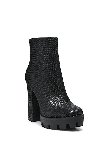 Collab Boutique black faux leather ankle boots with textured woven detail, platform sole, and chunky block heel.