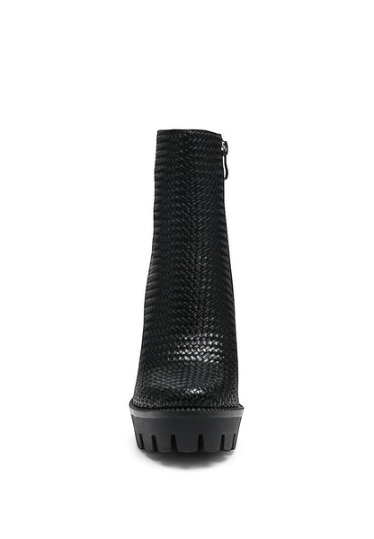 Collab Boutique black faux leather ankle boots with textured woven detail, platform sole, and chunky block heel.