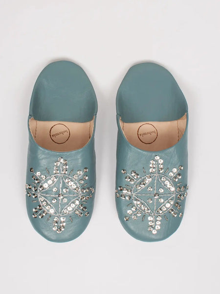 Collab Boutique blue leather Moroccan slippers with sequin starburst embroidery. Handmade for indoor use.