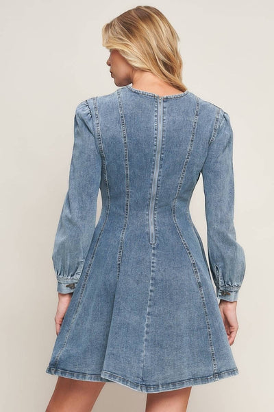 Collab Boutique light wash denim fit and flare mini dress with puff sleeves and back zipper.