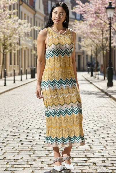 Collab Boutique geometric knit maxi dress with chevron pattern in yellow, green, and beige. Sleeveless, crew neck.