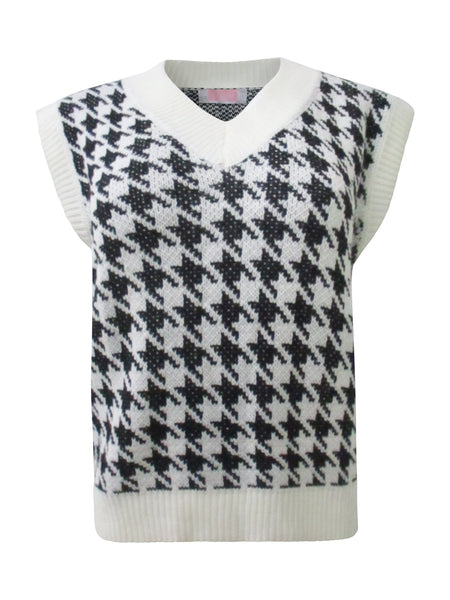 Collab Boutique black and white houndstooth knit V-neck vest. Sleeveless design.