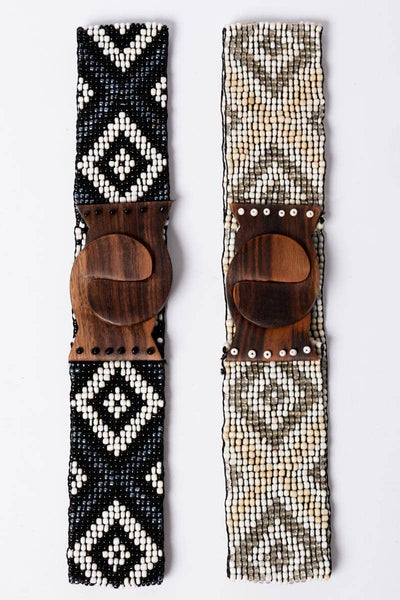Collab Boutique ivory diamond patterned beaded belt with elastic and wooden buckle. Stretches.