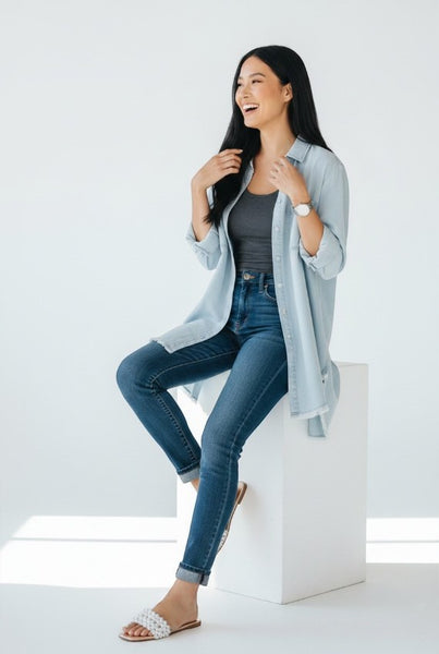 Collab Boutique light blue 100% cotton denim shirt dress with chest pockets and distressed hem.