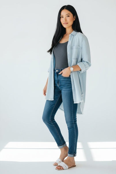 Collab Boutique light blue 100% cotton denim shirt dress with distressed hem and chest pockets.