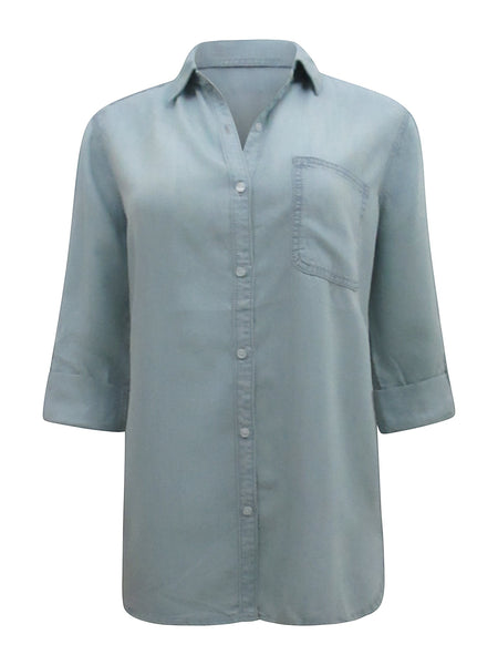 Collab Boutique light blue Tencel denim shirt with dolman sleeves and button cuffs. Features a single chest pocket and button-up front.