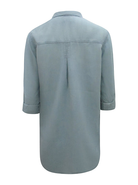 Collab Boutique light blue Tencel denim shirt with dolman sleeves and button cuffs.