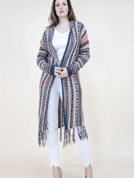 Collab Boutique longline knit cardigan with geometric pattern, fringe hem, and hood in multi-color earthy tones.