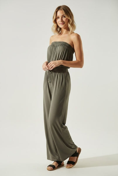 Collab Boutique olive green strapless wide-leg jumpsuit with smocked bodice and drawstring waist, made of rayon and spandex.