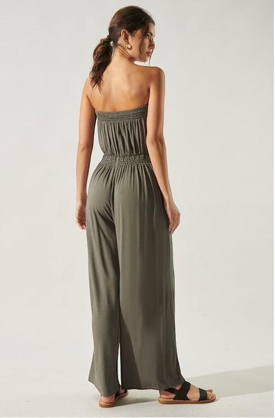 Collab Boutique olive green strapless wide-leg jumpsuit with smocked bodice and drawstring waist.