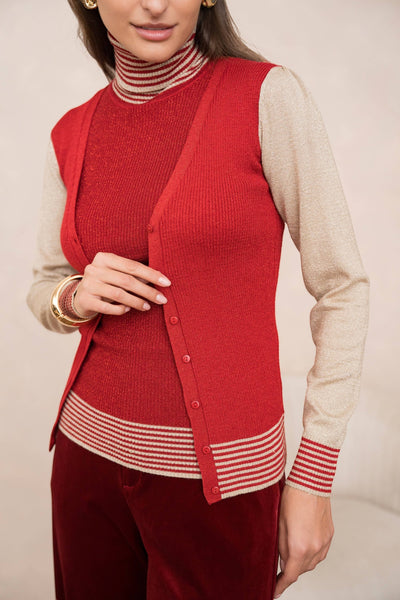 Collab Boutique red metallic knit cardigan with gold sleeves, v-neck, front buttons, and striped cuffs. Viscose blend.
