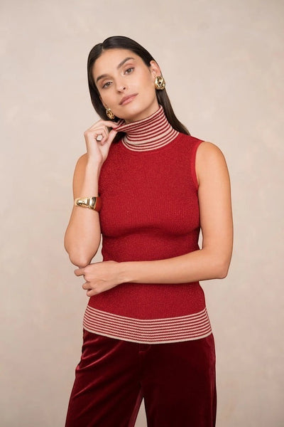 Collab Boutique red sleeveless knit turtleneck sweater with lurex glitter and bicolor stripe bands on collar and hem.