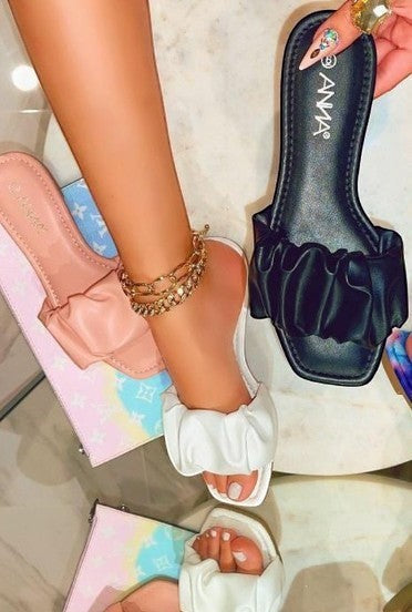 Collab Boutique ruffle slip-on flat sandals made of man-made material.