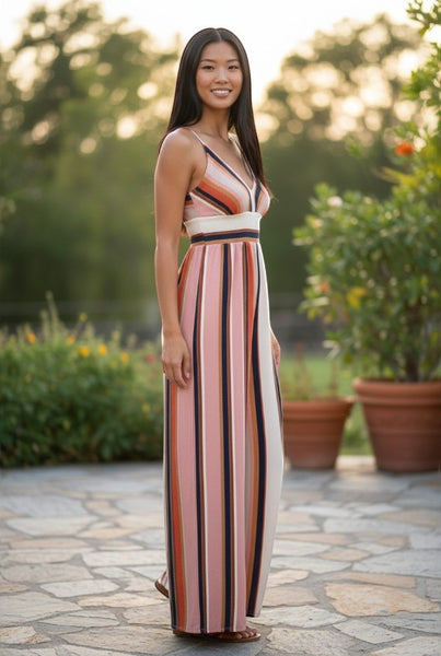 Collab Boutique striped V-neck maxi dress with empire waist in multi-color earthy tones. Model wears size S.