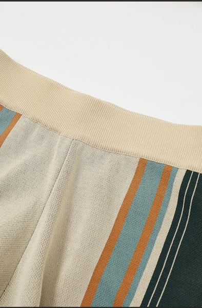 Collab Boutique cream, teal, and tan striped wide leg knit lounge pants with elastic waistband.