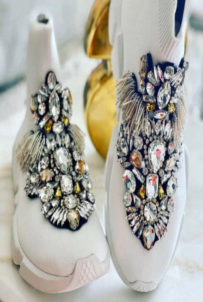 Collab Boutique white sock sneakers embellished with clear and gold crystals and silver fringe.