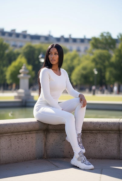 Collab Boutique white sock sneakers with jewel embellishments and tassel details.