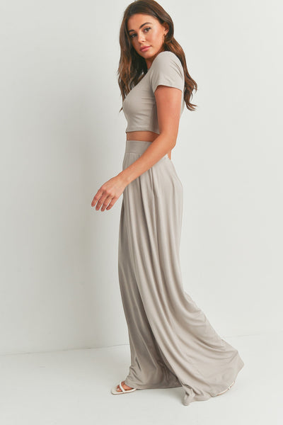 Collab Boutique neutral tone wide leg palazzo pant set with cropped top and flowing polyester-spandex fabric.