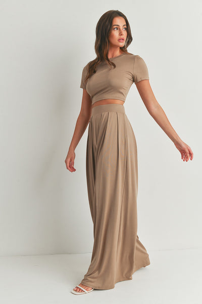 Collab Boutique taupe wide-leg palazzo pant set with cropped t-shirt and high-waisted pleated pants, made of polyester and spandex.