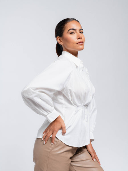 White contoured button up blouse. Balloon sleeves.