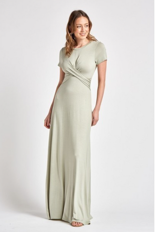 Solid rayon spandex t shirt maxi dress featuring round neck, short sleeve and twisted top detail